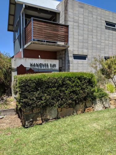 a building with a sign that reads hawker bay at Hanover Bay Apartments in Albany