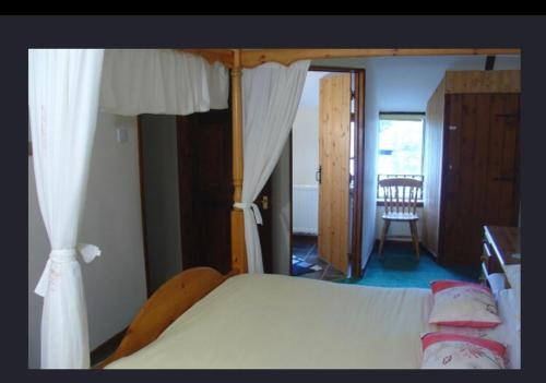 Ліжко або ліжка в номері Hayloft Cottage