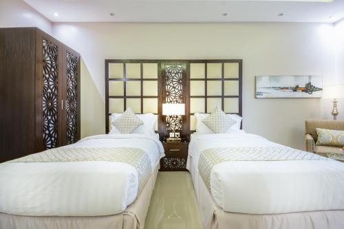 Katil atau katil-katil dalam bilik di Al Muhaidb Residence Al Dawadmi