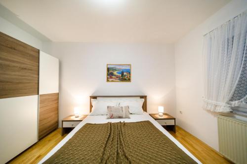 Ένα ή περισσότερα κρεβάτια σε δωμάτιο στο Apartment Anton