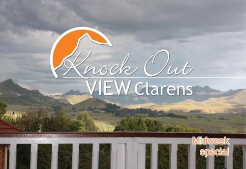 a sign for a view of the mountains at Knock Out View Clarens in Clarens