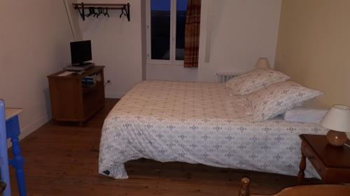 Cama ou camas em um quarto em Chambres d'hôtes Frehel