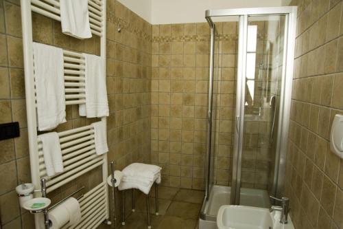 a bathroom with a shower and a sink at Agriturismo Aqua Viva in Acquaviva Picena