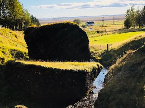 a painting of a river in a field at Hamrafoss Holiday Home in Foss a Sidu