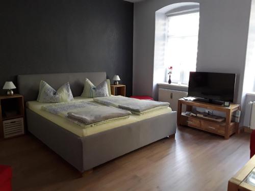 Postel nebo postele na pokoji v ubytování Ferienwohnung am See