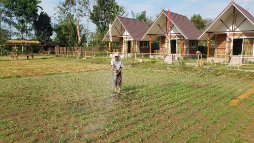Ein Garten an der Unterkunft ฮ้างนาตาจันทร์