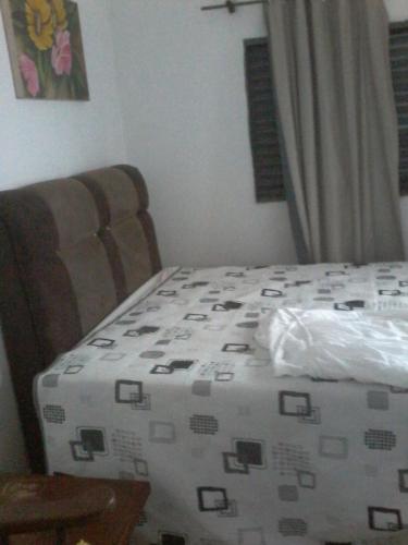 Cama o camas de una habitación en Pousada Vila Tiberio