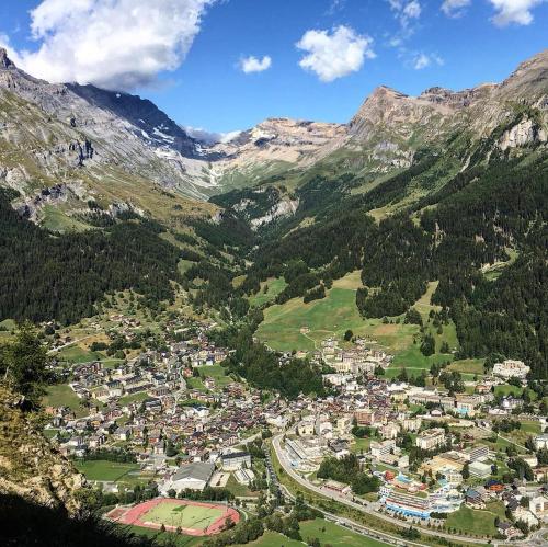 an aerial view of a town in the mountains at Apartments Residenz Iris in Leukerbad