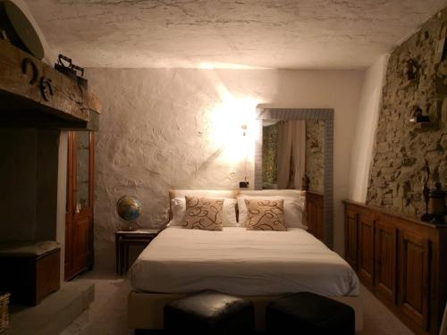 Un pat sau paturi într-o cameră la Casa al Riccio