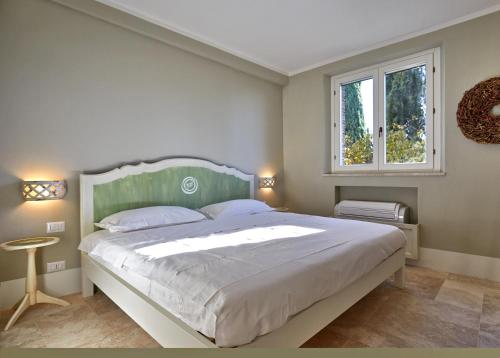 Un pat sau paturi într-o cameră la The Nest in Maremma Tuscany