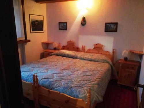 Cama ou camas em um quarto em Appartamento Piancavallo