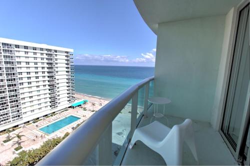 a balcony with a view of the beach and the ocean at The Tides on Miami Hollywood in Hollywood