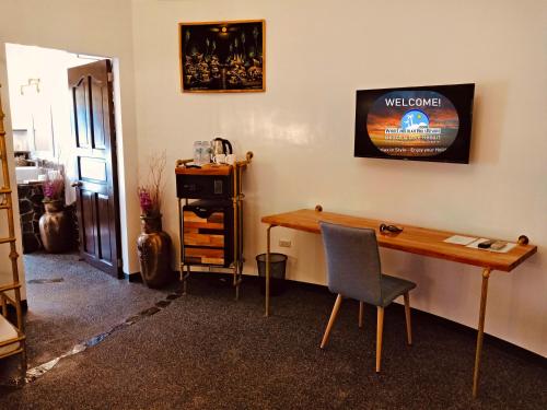 Μια τηλεόραση ή/και κέντρο ψυχαγωγίας στο White Chocolate Hills Resort
