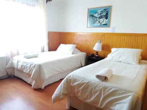 Cama o camas de una habitación en Agostini Hotel