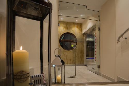 Koupelna v ubytování Trofana Wellness & SPA