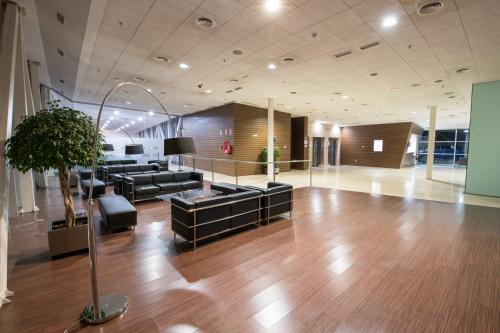 The lobby or reception area at ARVA Abad San Antonio