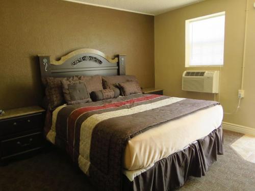 Postel nebo postele na pokoji v ubytování Best Inn Motel Salina