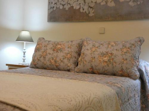 Letto o letti in una camera di Núcleo de Turismo Rural Valle de Iruelas
