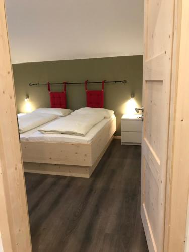 Postel nebo postele na pokoji v ubytování Alpenlodge Kirchbach