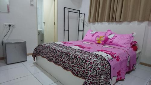 Кровать или кровати в номере Vista Alam Roomstay Homestay