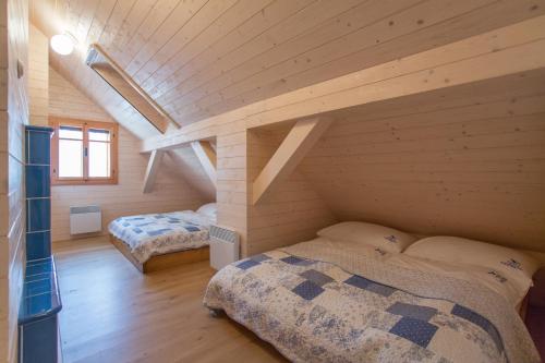 Postel nebo postele na pokoji v ubytování Orlí Hnízdo