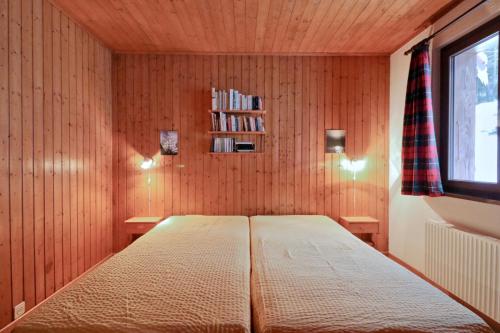 Letto o letti in una camera di Modern and well equipped apartment, 500m from the 4 Vallées ski area