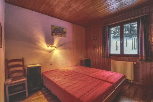 Letto o letti in una camera di Modern and well equipped apartment, 500m from the 4 Vallées ski area