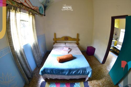 Ένα ή περισσότερα κρεβάτια σε δωμάτιο στο Hostel Tiradentes