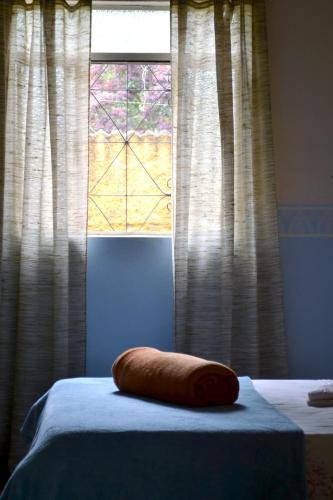 Ένα ή περισσότερα κρεβάτια σε δωμάτιο στο Hostel Tiradentes