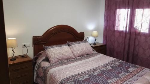 Un pat sau paturi într-o cameră la Mas Panoli
