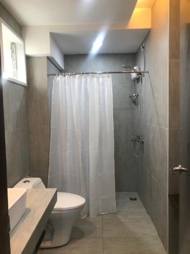 Ett badrum på Hotel Capada