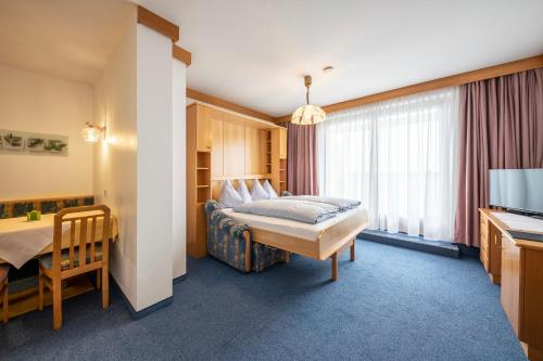 Postel nebo postele na pokoji v ubytování Frühstückspension-Appartementhaus Wasserer