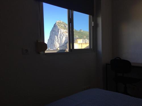 Ein Bett oder Betten in einem Zimmer der Unterkunft Monkey Room