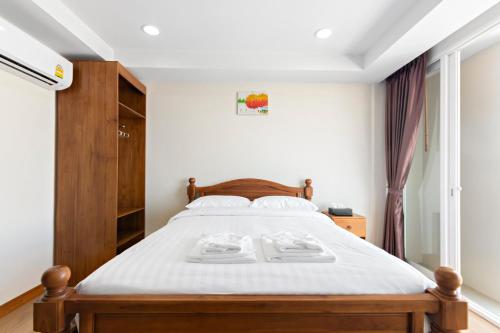 Ένα ή περισσότερα κρεβάτια σε δωμάτιο στο Royale 8 Ville Guest House