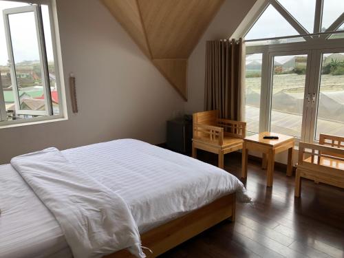 Postel nebo postele na pokoji v ubytování Spring Hotel