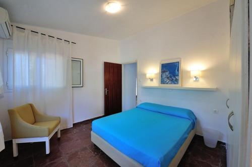 Ένα ή περισσότερα κρεβάτια σε δωμάτιο στο Villa Ftelia