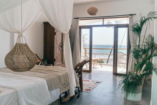 Postel nebo postele na pokoji v ubytování Dreamsea Sri Lanka