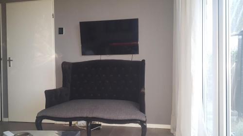 Zona de estar de B&B Het Zwanennest