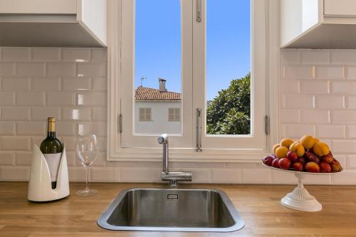 Η κουζίνα ή μικρή κουζίνα στο Apartment Rosmare III