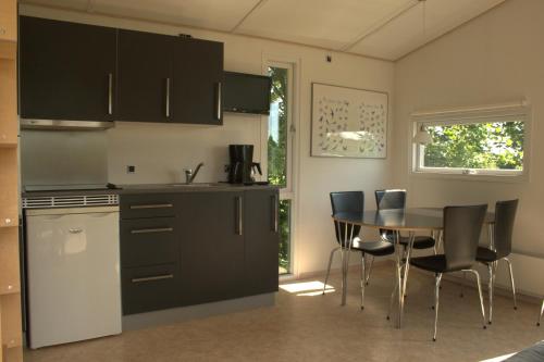 Kjøkken eller kjøkkenkrok på Sorø Camping & Cottages