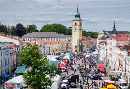 a crowd of people walking down a busy city street at Penzion V Podzámčí Litomyšl in Litomyšl