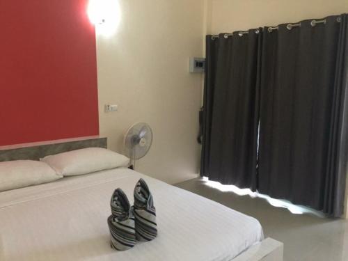 Budchui Guesthouseにあるベッド
