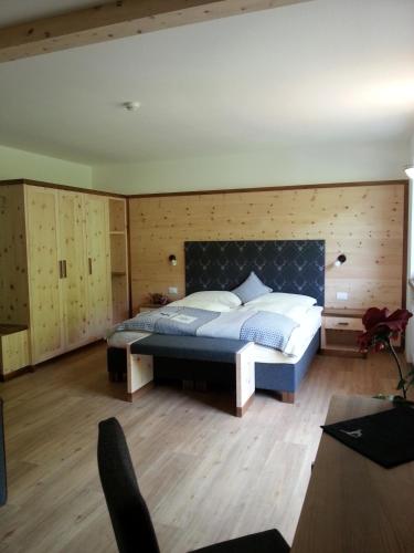 Una cama o camas en una habitación de Hotel Alcialc