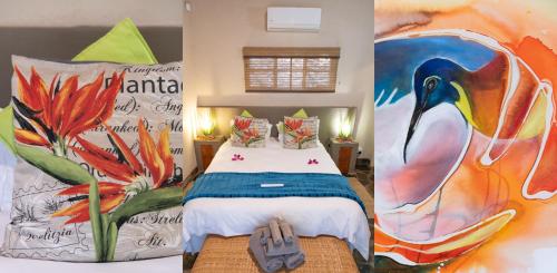 a bedroom with a bed with a painting of a bird at Blyde River Wilderness Lodge in Hoedspruit