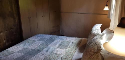 Postel nebo postele na pokoji v ubytování Cabañas Sol de Abril