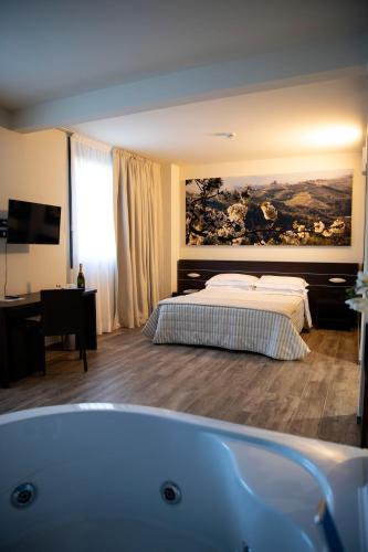 Letto o letti in una camera di Castahotel