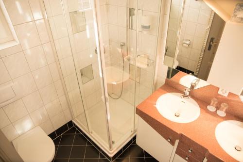 Ein Badezimmer in der Unterkunft Hotel Toggenburgerhof