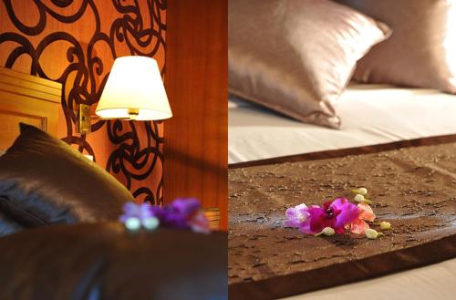 two pictures of a bed with flowers on the floor at Oxford Hotel in Singapore
