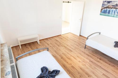 Postel nebo postele na pokoji v ubytování AVR Apartment Geestemunde 2