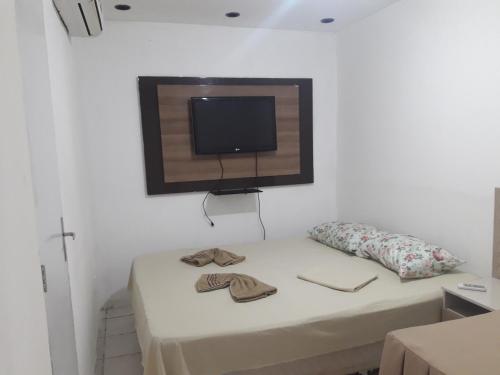 TV a/nebo společenská místnost v ubytování Pousada Manaíra Buena Playa